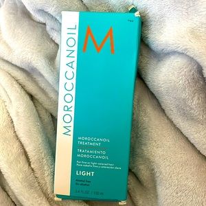 Moroccanoil Treatment Light. 3.4 oz. Brand new (small corner of box damaged)